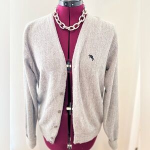 Cardigan size Medium brand is Steeplechase.  Color is a medium heather gray.